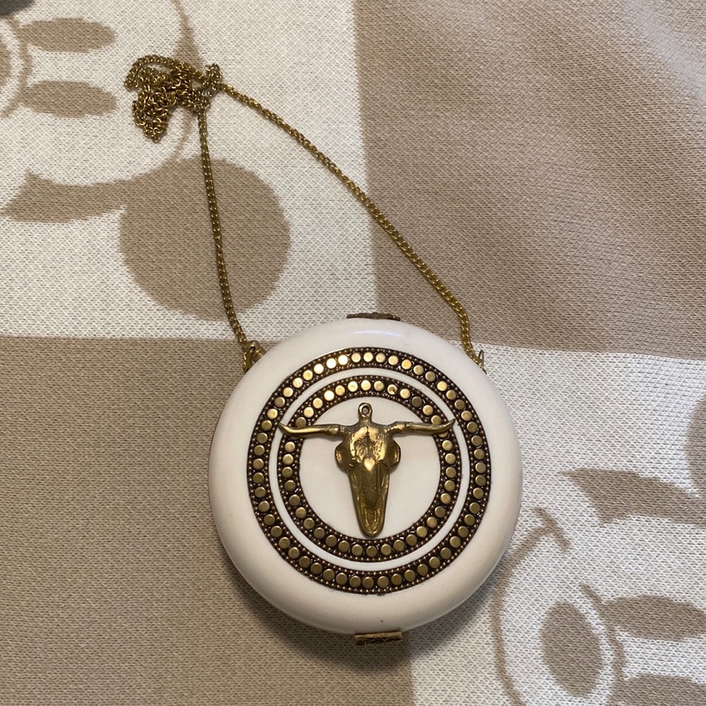 Greek golden minotaur detailed ivory colored clutch/cross body bag